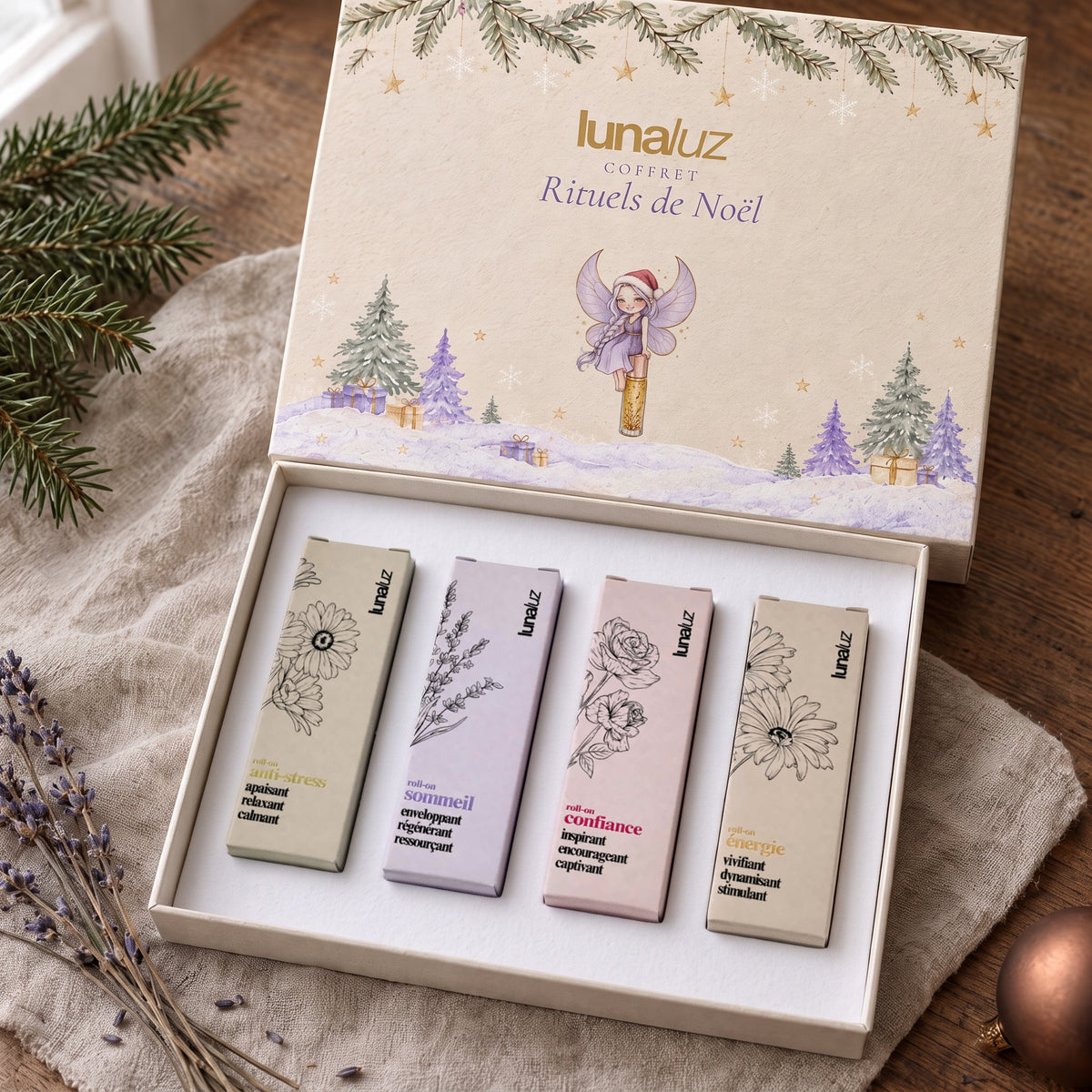 Coffret ouvert : les quatre roll-ons Énergie, Confiance, Anti-Stress et Sommeil dans leurs étuis